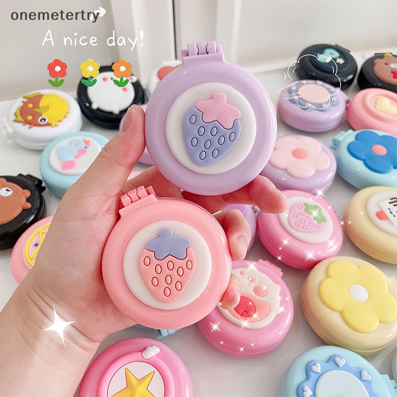Em Lược Chải Tóc Dạng Gập Hình Tròn Nhỏ Bằng Nhựa Có Túi Khí Và Gương Trang Điểm Hình Hoạt Hình Dễ Thương Có Thể Mang Theo