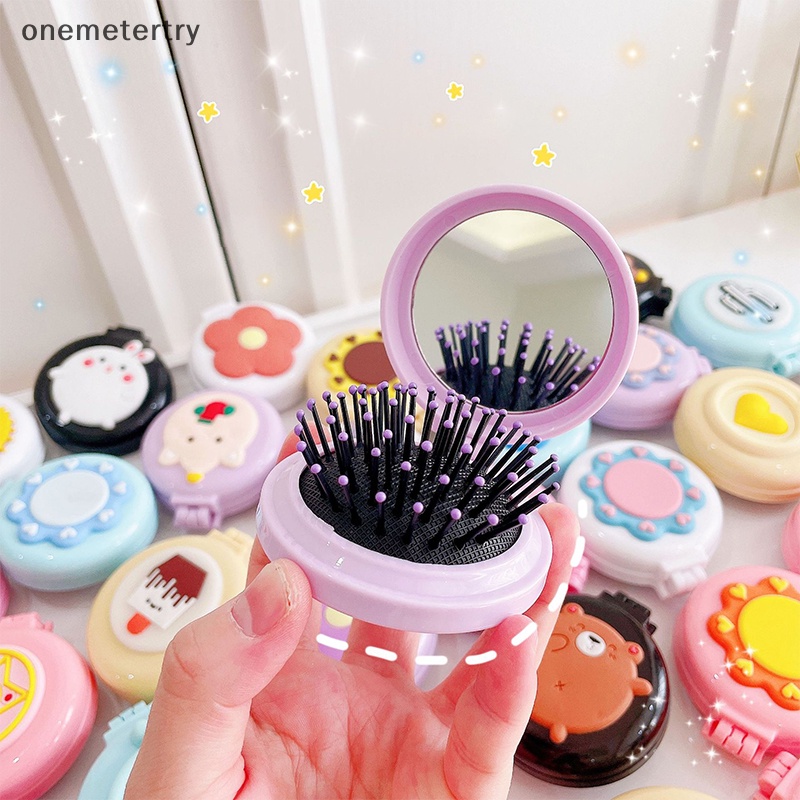Em Lược Chải Tóc Dạng Gập Hình Tròn Nhỏ Bằng Nhựa Có Túi Khí Và Gương Trang Điểm Hình Hoạt Hình Dễ Thương Có Thể Mang Theo