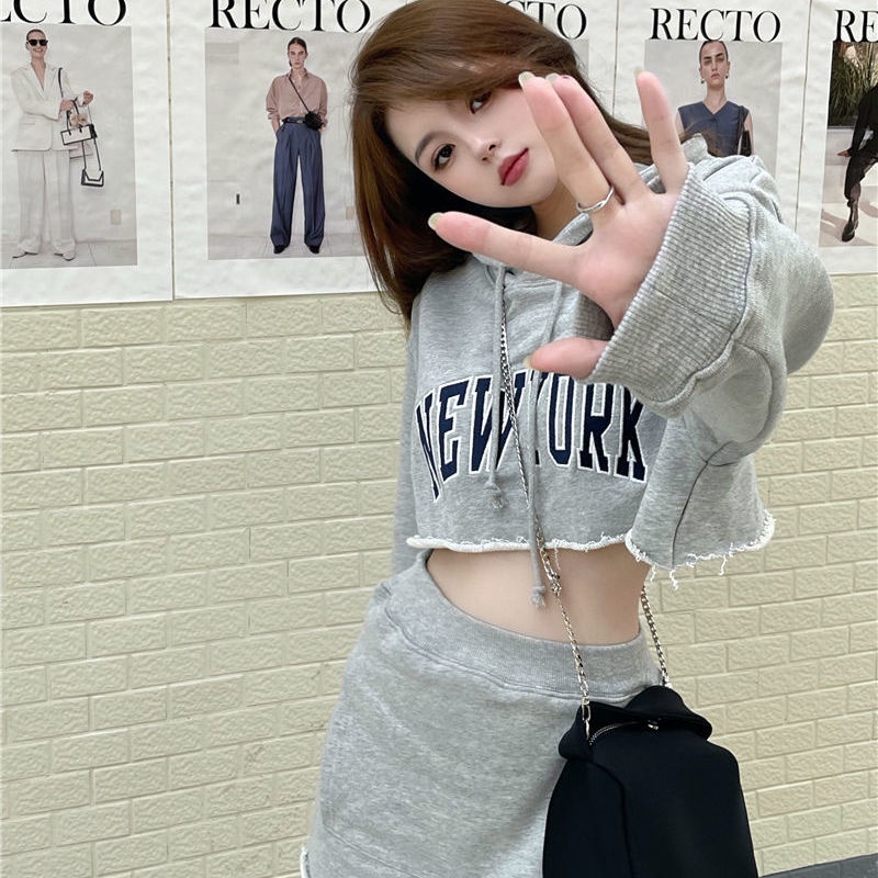 New hot girl short hooded long sleeve knitted suit loose letter printed sweater hip-covered skirt casual sports two-piece set