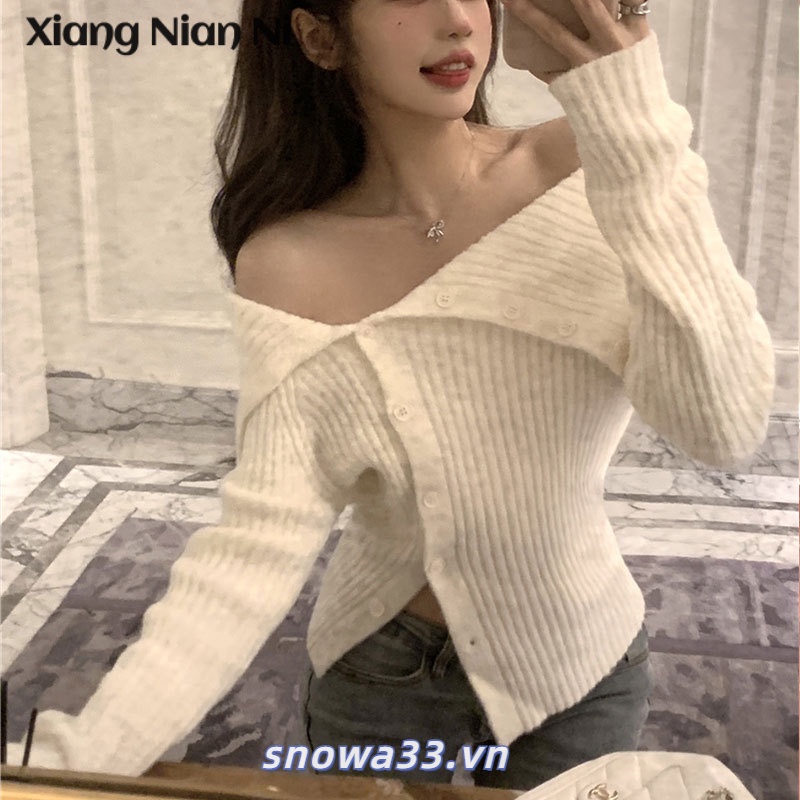 Xiang NIAN NI Ve áo cardigan dệt kim không đều nữ mùa thu đông màu hồng lệch vai gợi cảm đáy áo len mỏng hàng đầu xu hướng hot girl