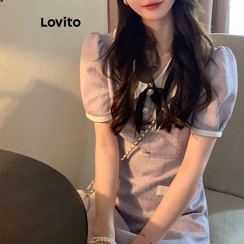 Đầm Lovito tay phồng cổ tương phản đính nơ phối túi giả màu trơn thường ngày cho nữ LNA17158