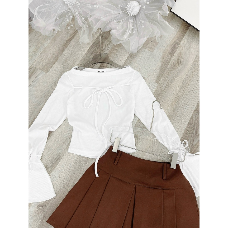 Set áo trắng cột nơ tay loe+chân váy xếp ly nâu