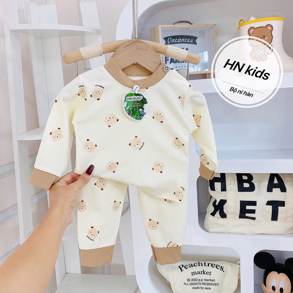 Bộ dài Hnkids cotton nỉ cài vai nền kem cho bé trai, bé gái