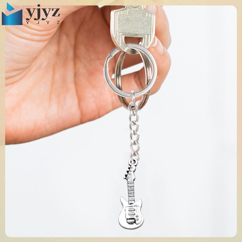 Set 20 Miếng Gảy Đàn Ghita Kèm Giá Đỡ Đeo Tay Trang Sức Dành Cho Nam