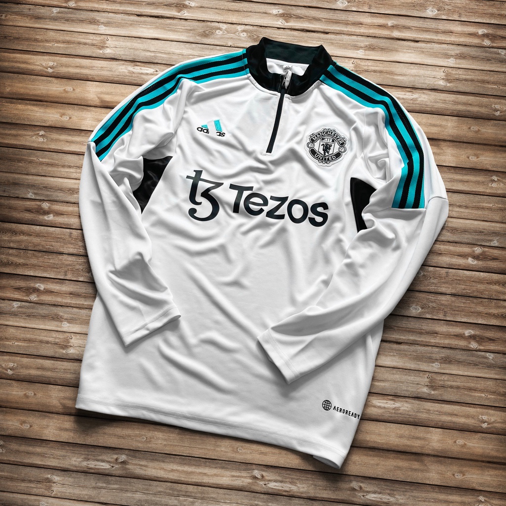 AK Training MU-Half ZIP-Trắng 3 sọc xanh lơ