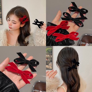 Kẹp tóc nơ nhung đỏ phối tua rua bên hông