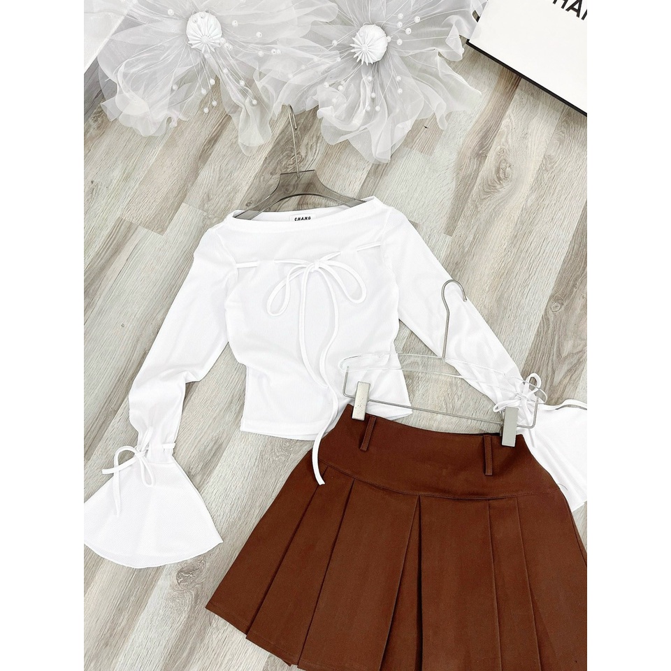 Set áo trắng cột nơ tay loe+chân váy xếp ly nâu