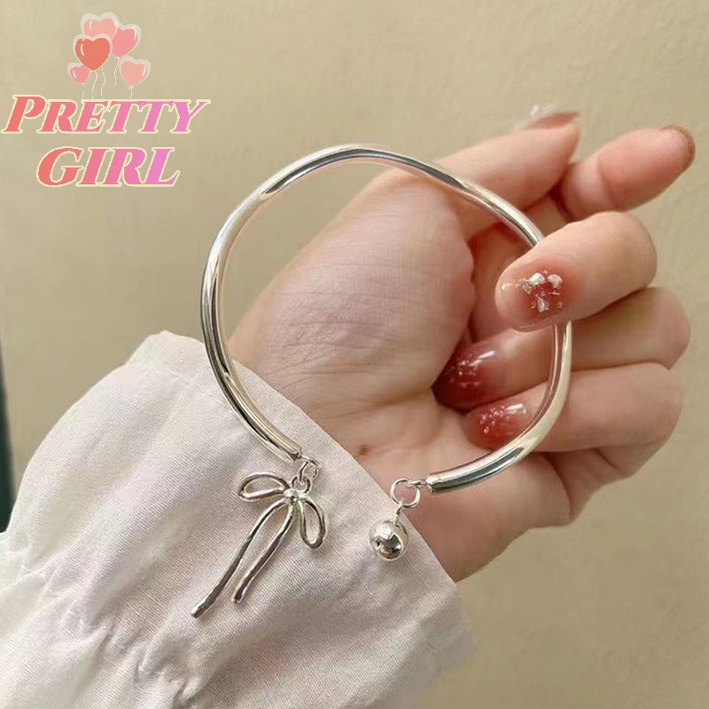 Vòng Tay Hở Mặt Hình Nơ Đơn Giản Nhẹ Nhàng Với Chuông Trang Sức Đi Tiệc