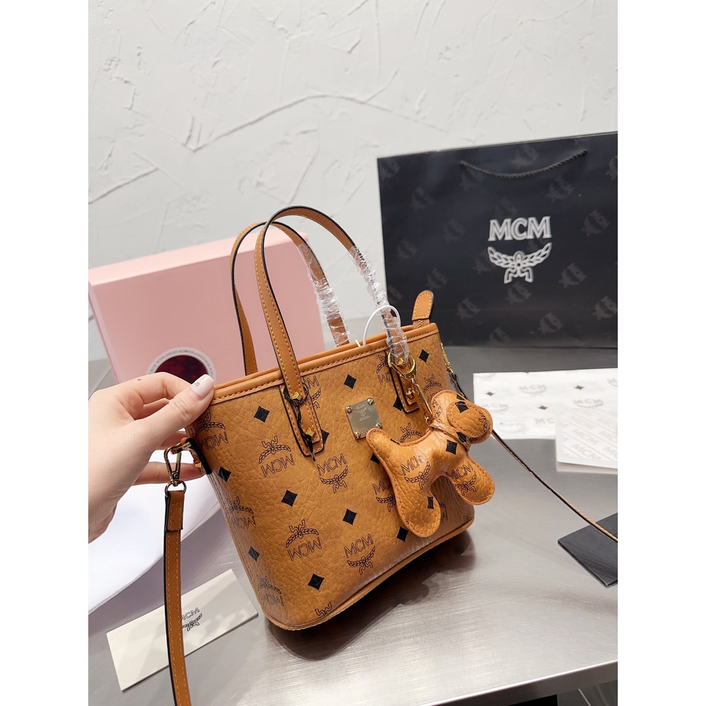MCM star same dish basket bag fashion trendy essential item metal zipper printed canvas women's bag