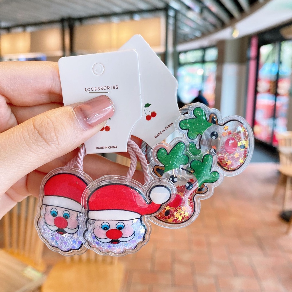 Kẹp Tóc Trong Suốt Hình Ông Già Noel Phối Cát Chảy Dễ Thương Cho Bé