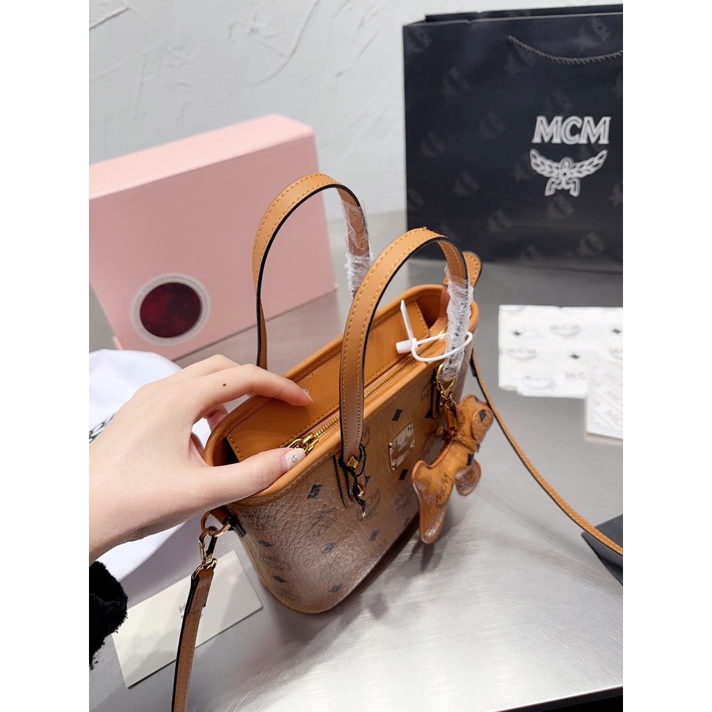 MCM star same dish basket bag fashion trendy essential item metal zipper printed canvas women's bag