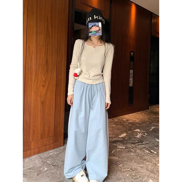 Áo Thun Nữ Tay Dài Cổ Tròn Cài Nút Họa Tiết Hoa Thời Trang Mới