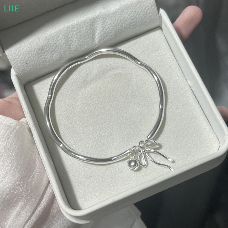 Vòng Tay Hở Mặt Hình Nơ Đơn Giản Nhẹ Nhàng Có Chuông Trang Sức Tiệc Tùng