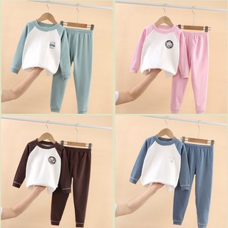 Trẻ em trẻ em đức nhung giữ nhiệt phù hợp với quần áo mùa thu lớn trẻ em quần dài bé trai bé gái quần áo nhà đế quần áo trẻ em ohpz