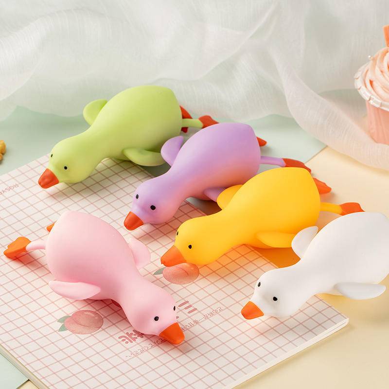 Đồ Chơi Bóng Nhấn Giảm Căng Thẳng Hình Chú Vịt Vàng Nhỏ Màu Trắng Vui Nhộn