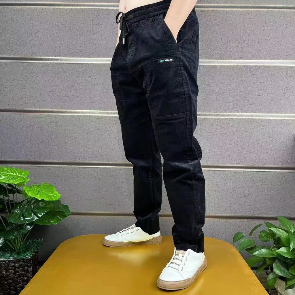 Quần Dài Dáng Ôm Vải Nhung Kẻ Sọc Phối Nhiều Túi Thời Trang Thu Đông Cho Nam