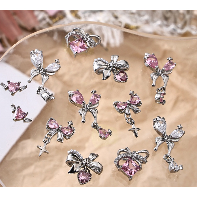 Phụ kiện trang trí móng tay hình nơ màu hồng Zircon / Mặt dây chuyền tình yêu ánh sáng bạc sang trọng trang sức kim cương trang trí móng tay / Đồ trang sức móng tay khảm kim cương hình nơ