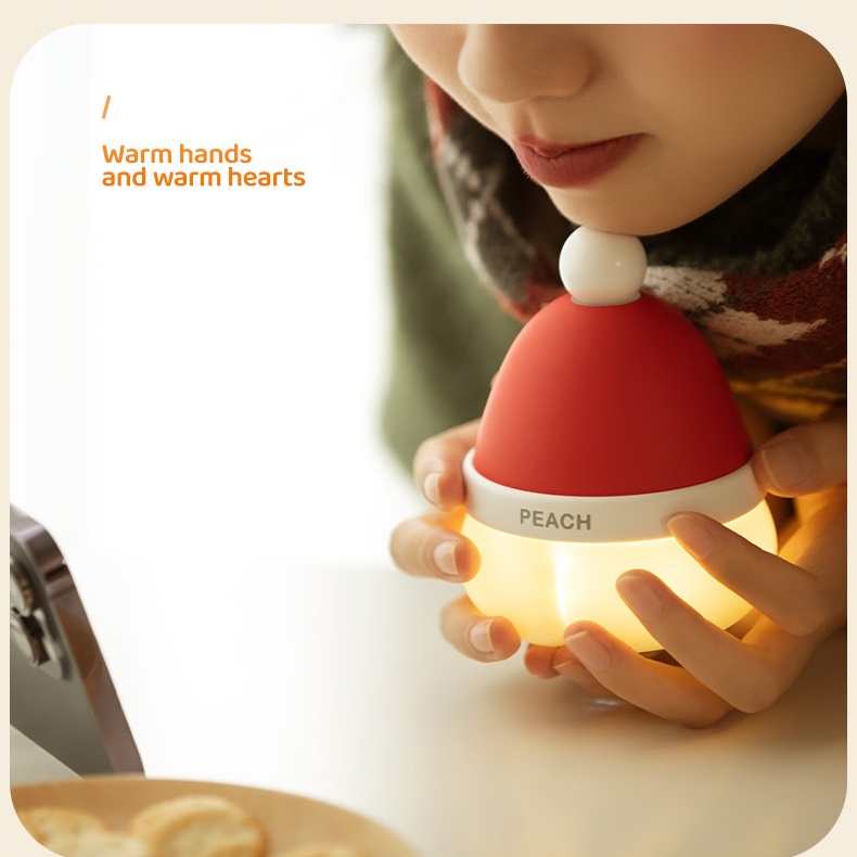 Fnelse Máy Sưởi Ấm Tay Nhanh Chóng Hình Quả Đào Giáng Sinh Hai Trong Một Sạc Lại Được Cho Trẻ Em Hoạt Động Ngoài Trời one