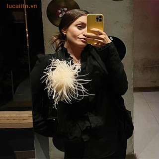 Trâm cài áo hình lông vũ thời trang cho nữ vn