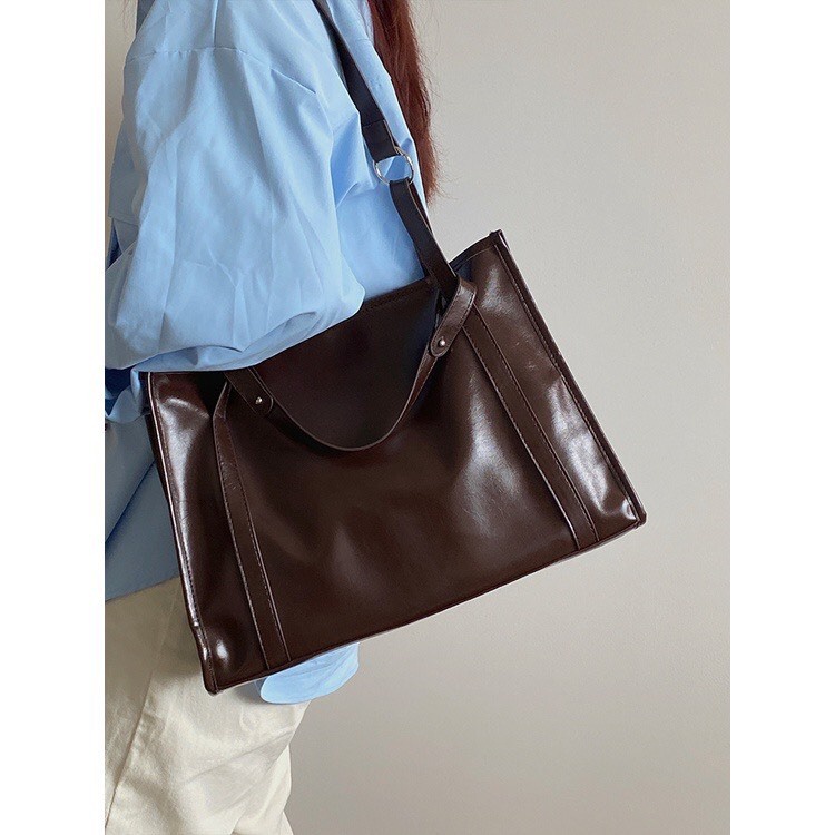 Túi tote đeo vai nữ da mềm hai màu mã mới t164 TIEMGIAYYEN3