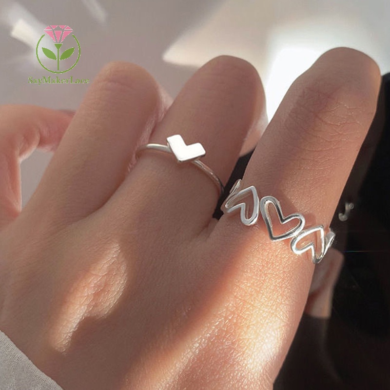 Set nhẫn SayMakerLace hình trái tim rỗng màu bạc đơn giản cá tính chỉnh được