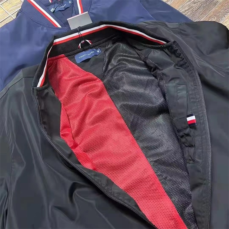 Áo Khoác Gió Thêu logo tommy hilfiger 100% Chính Hãng Phối Lưới Kẻ Sọc Bên Trong Có Khóa Kéo Cho Cặp Đôi