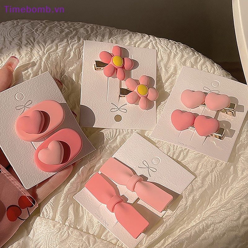 Bộ 2 / 3 Kẹp Tóc Hình Nơ / Trái Tim Màu Hồng Dễ Thương Cho Bé Gái