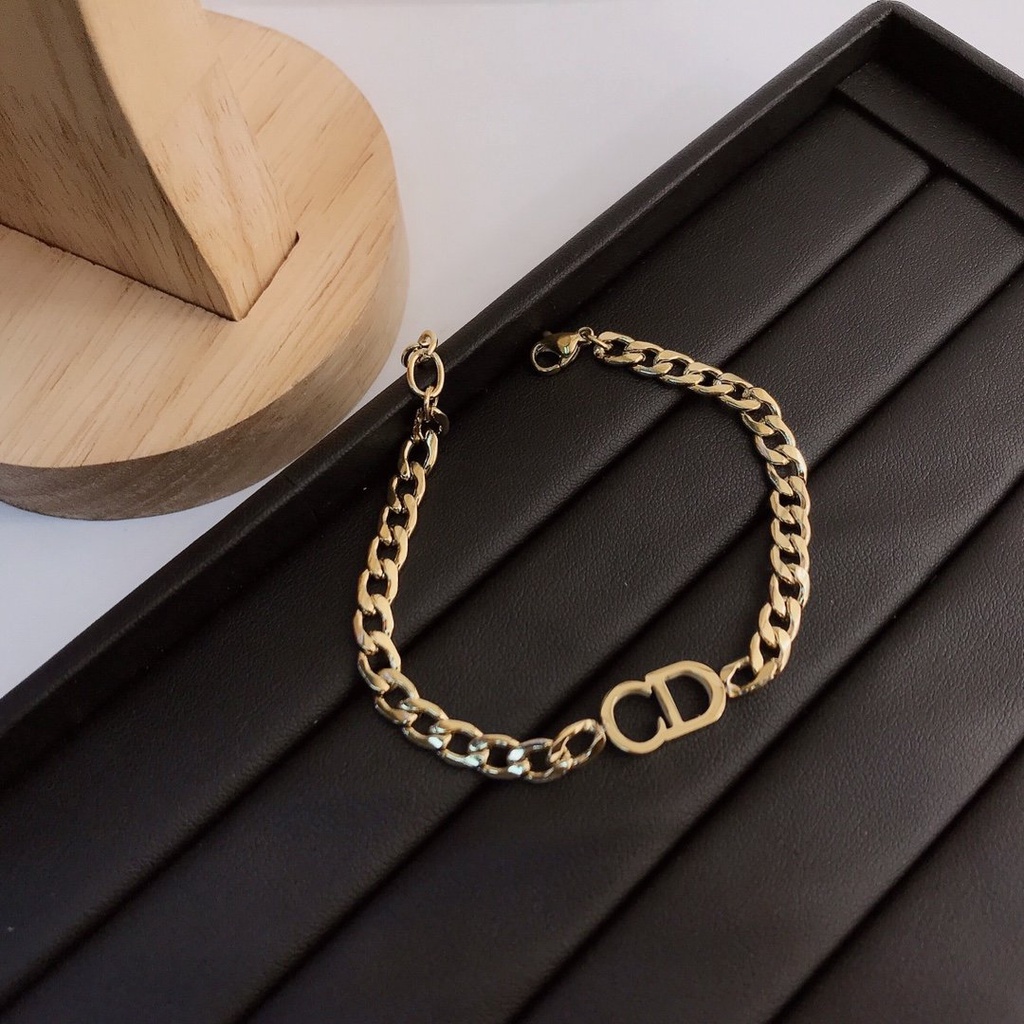 Vòng Đeo Tay dior Bằng Thép Titan Chống Nước Không Gỉ In Chữ Rỗng Đơn Giản