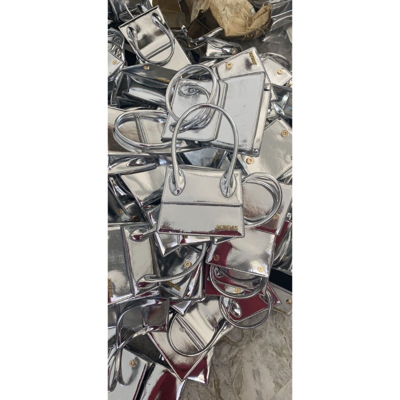 Túi xách nữ Jac cầm tay bạc tráng gương sang chảnh có dây đeo chéo.