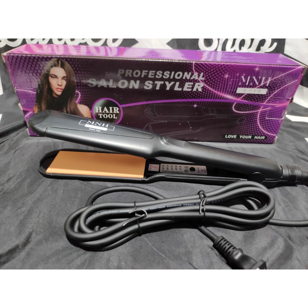 Kẹp duỗi tóc điện MNH402 chuyên salon tóc