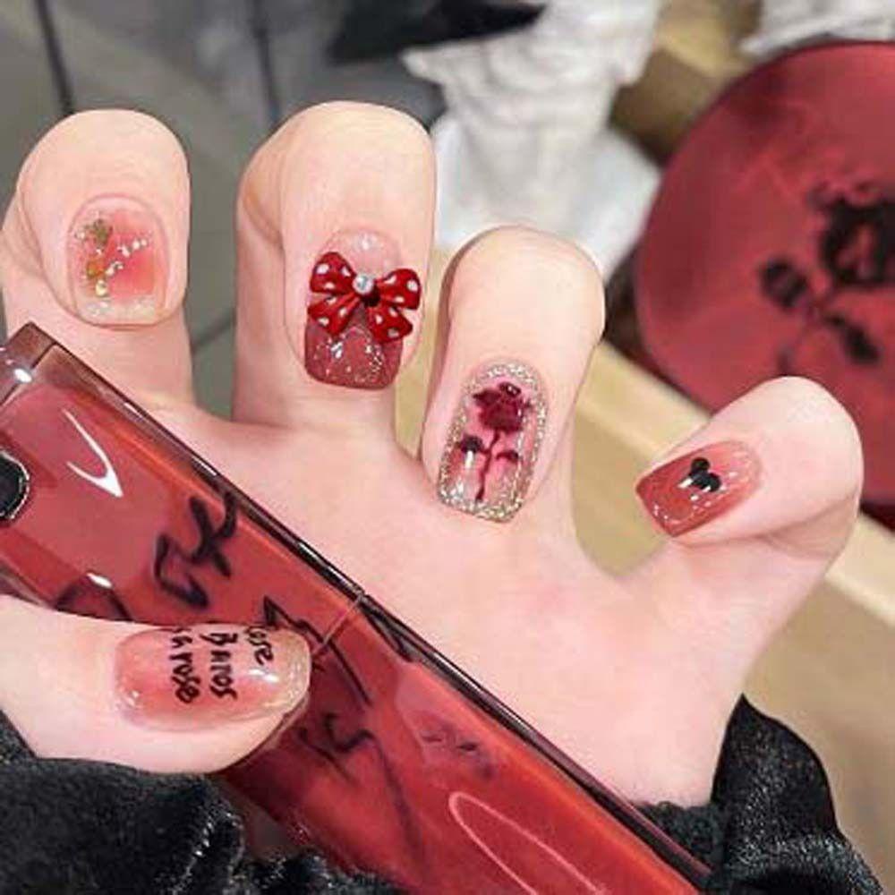 Bộ 5 Phụ Kiện Trang Trí Móng Tay Hình Nơ Màu Đỏ Đục Đính Đá Charm Năm Mới