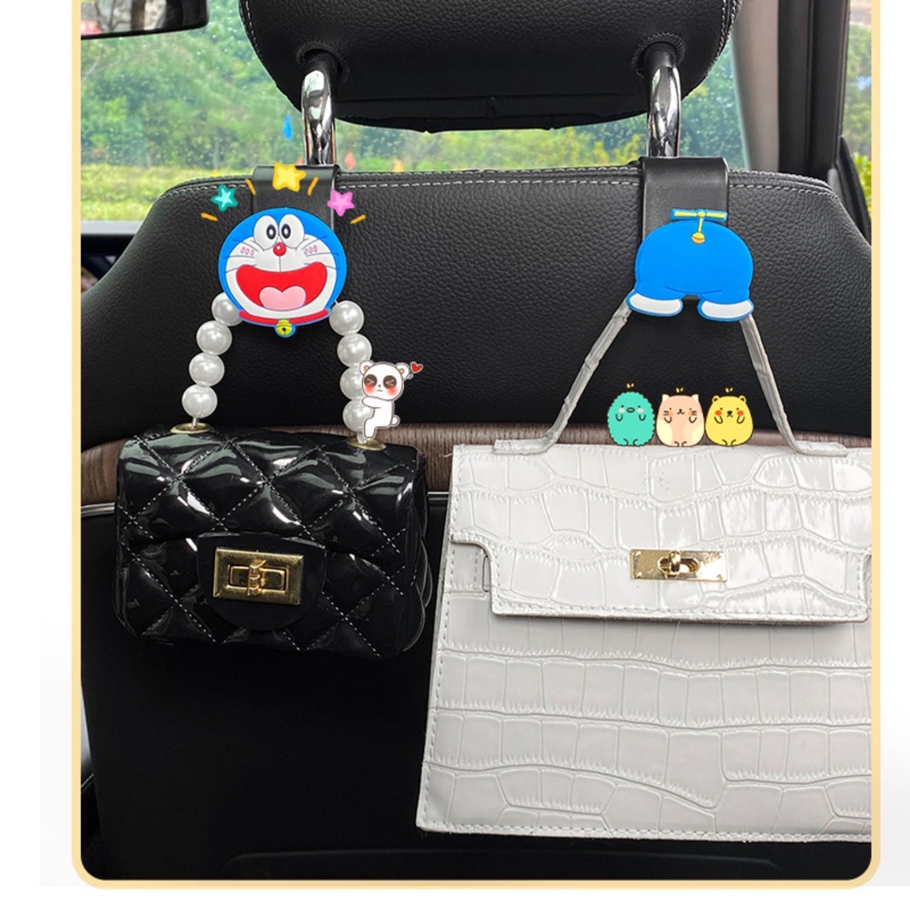 Bộ 2 Móc Treo Đồ Gắn Sau Ghế Xe Hơi Đa Năng Hình doraemon / melody / Cậu Bé Bút Chìa Khóa