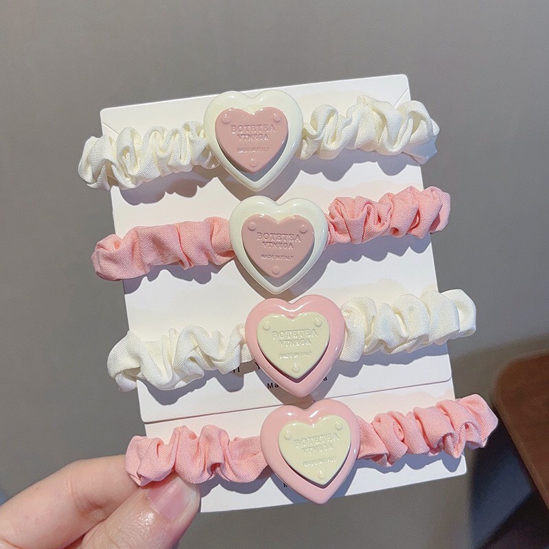 Set 9 chi tiết  kẹp , chun tóc 2 màu hồng trắng hot hít