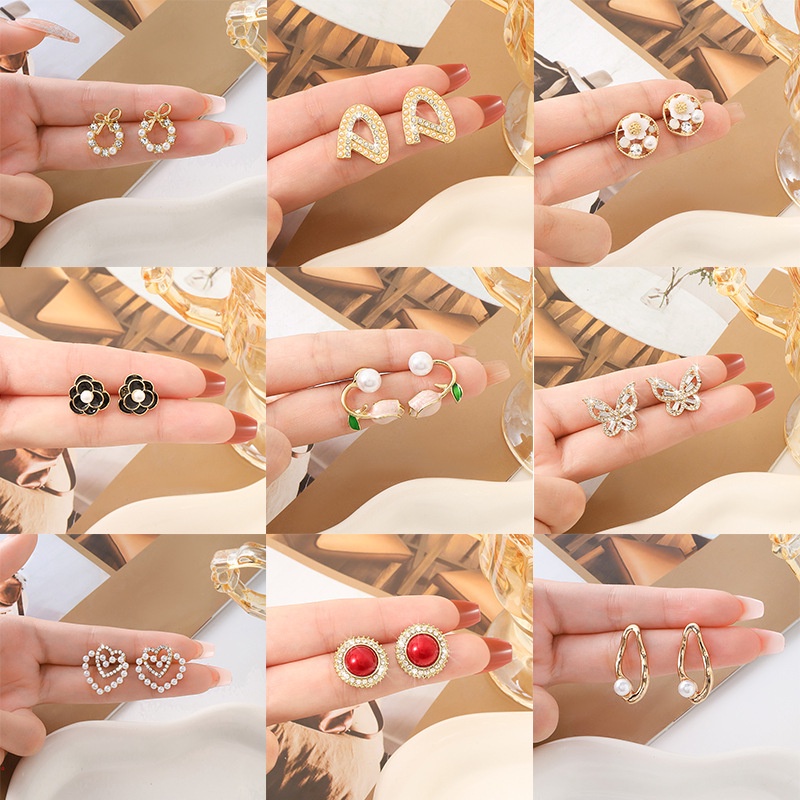 Đôi Khuyên Tai Dáng Dài Đính Ngọc Trai Thiết Kế Thời Trang