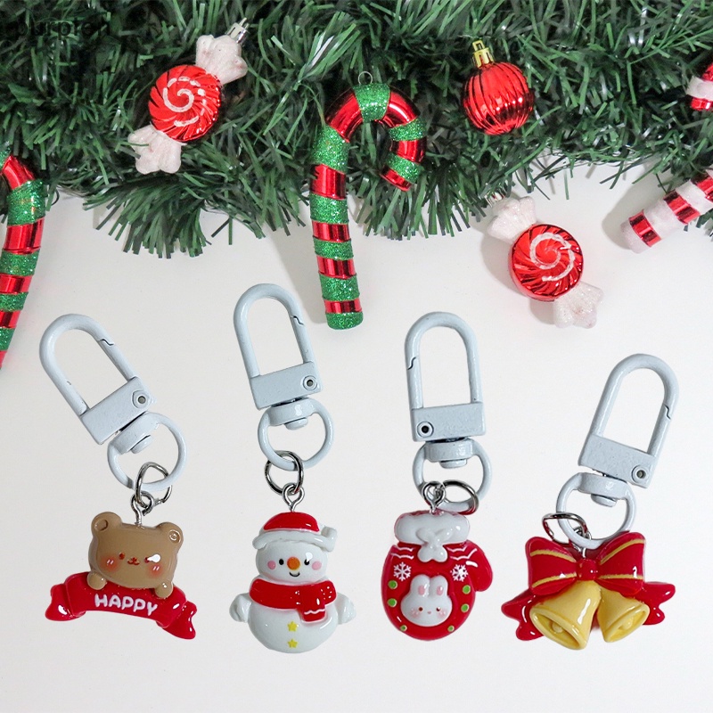 Móc Khóa Nhựa Hình Ông Già Noel Tuần Lộc Hoạt Hình Màu Tím Dễ Thương