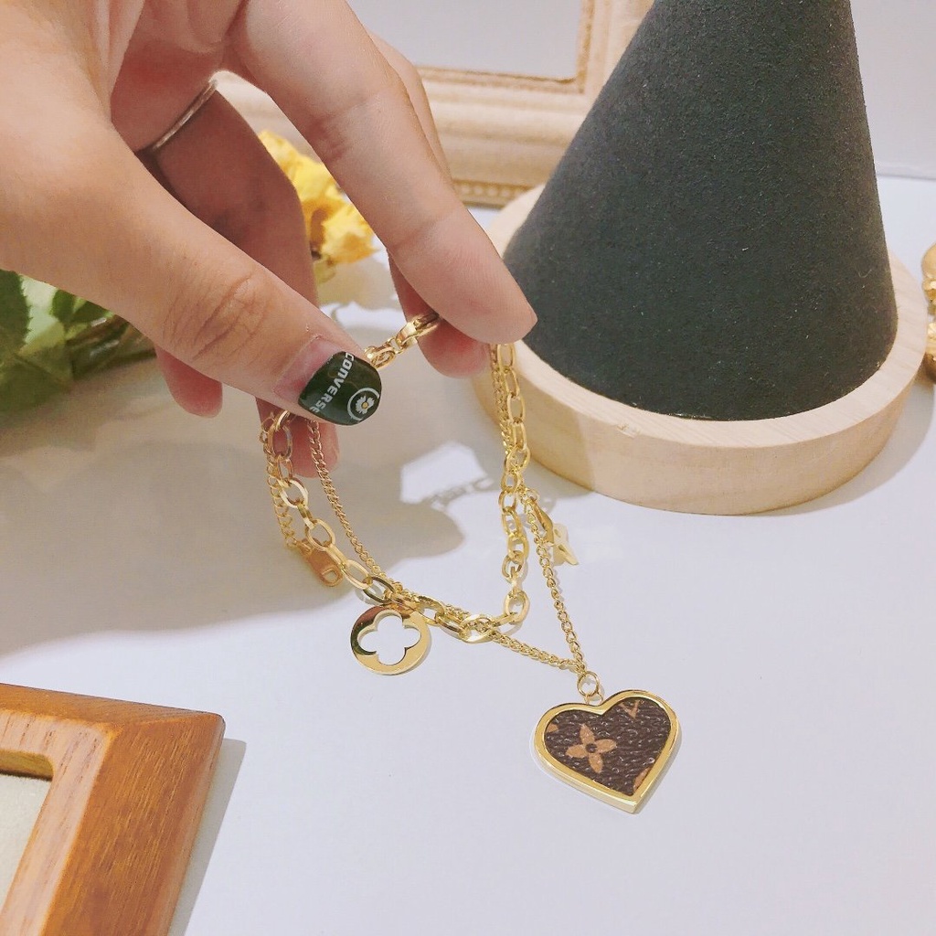 Vòng Tay louis vuitton Bằng Thép Titan Khắc Chữ lv monogram