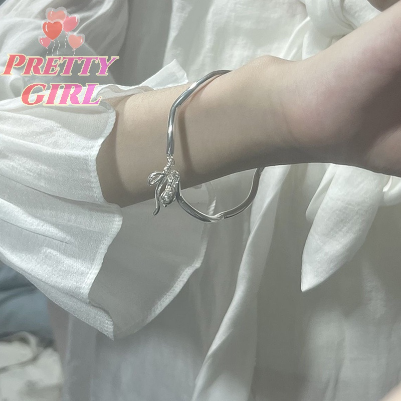 Vòng Tay Hở Mặt Hình Nơ Đơn Giản Nhẹ Nhàng Với Chuông Trang Sức Đi Tiệc