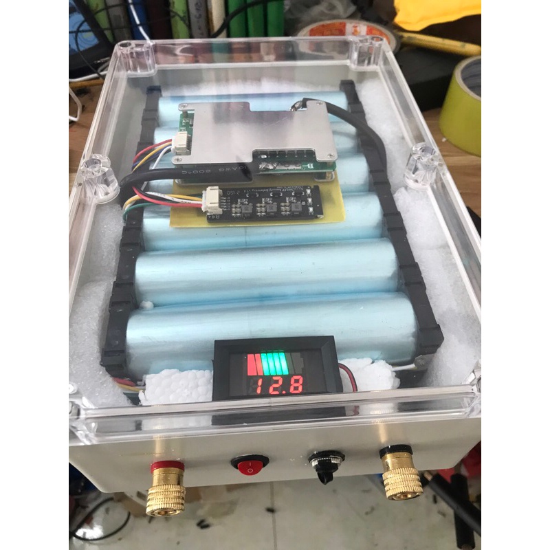 Bình pin lithium 45ah 12v BMS 4s 120a và sạc 10a vỏ hộp mặt trong suốt