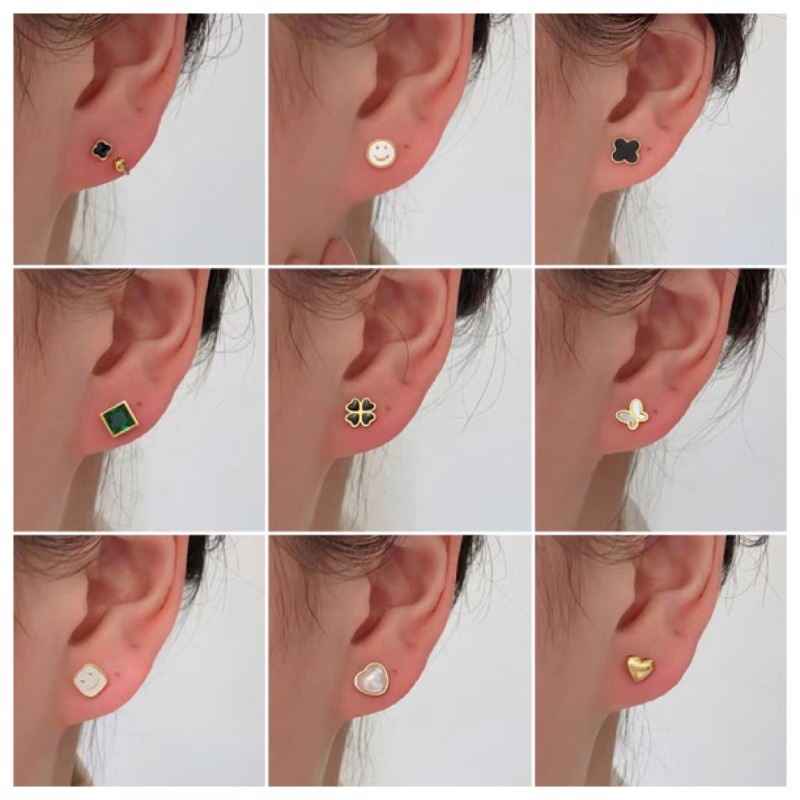 Khuyên Tai Xoắn Ốc Bằng Thép Titan Không Phai Màu Hình Cỏ Bốn Lá Đơn Giản Thời Trang