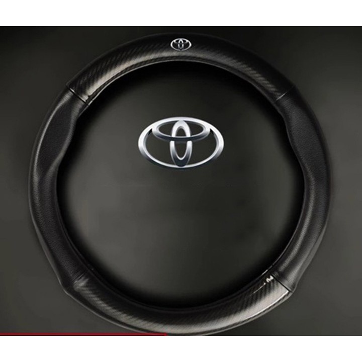 Bọc vô lăng cacbon có logo TOYOTA vios, innova, fortuner, avanza, raize, cross, hilux, camry cao cấp loại 1 + size 38cm