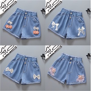 Quần short jean NNJXD bằng cotton phối ren thắt nơ thời trang xinh xắn cho bé gái