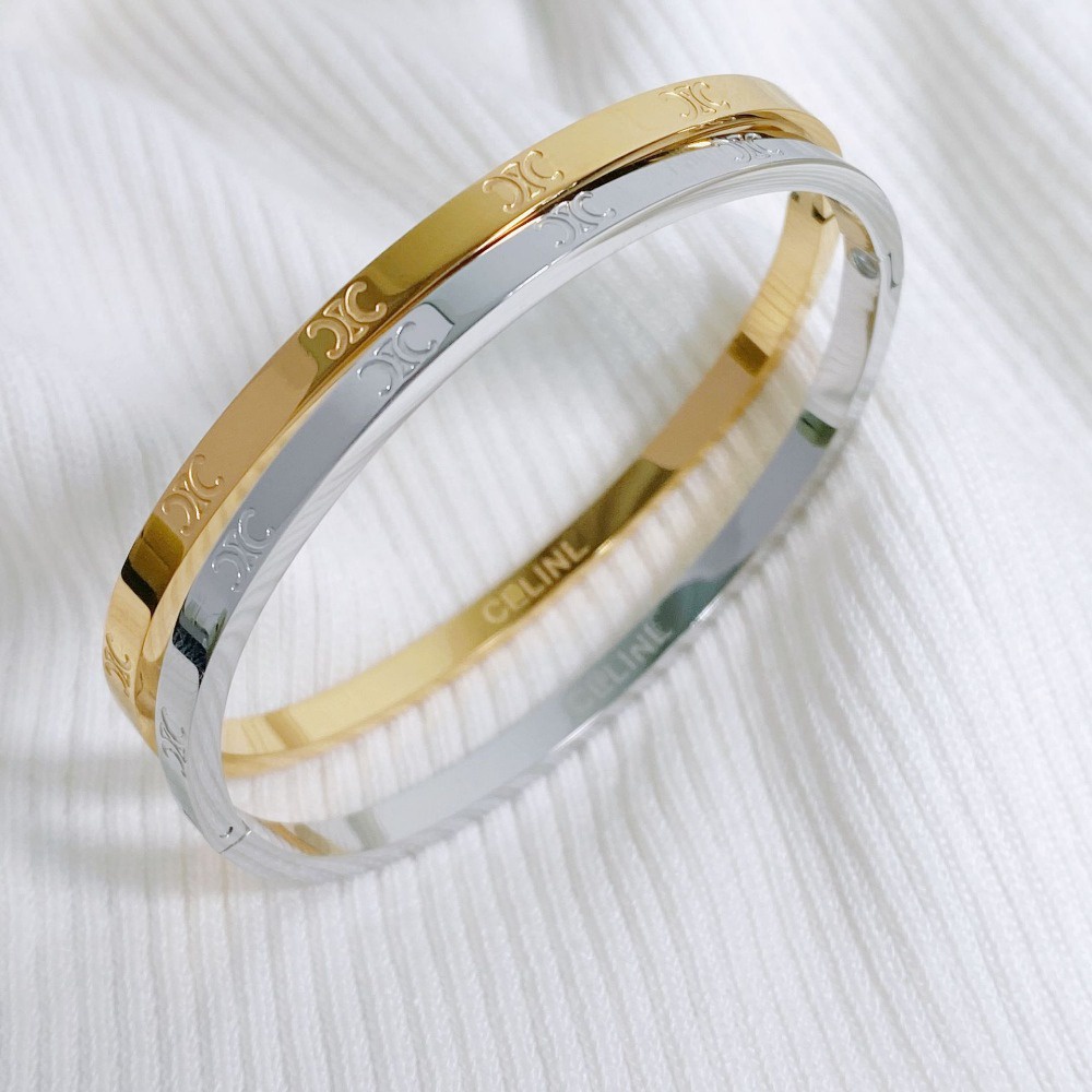 Triumph Vòng Tay Thép Titan Mạ Vàng In Chữ Đơn Giản Dễ Phối Đồ Thời Trang Cho Nữ