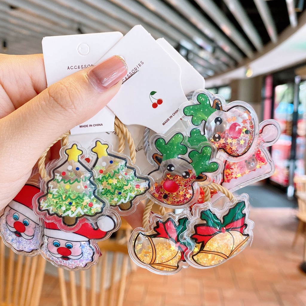 Kẹp Tóc Trong Suốt Hình Ông Già Noel Phối Cát Chảy Dễ Thương Cho Bé
