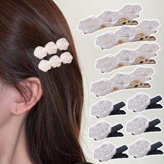 Kẹp tóc mái hoa nhỏ màu trắng hoa trà cho nữ