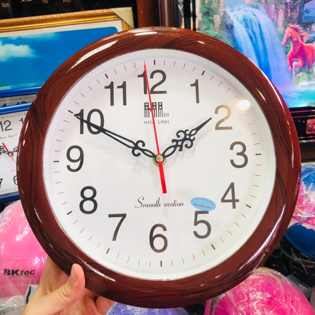 Đồng hồ treo tường Hoa Linh