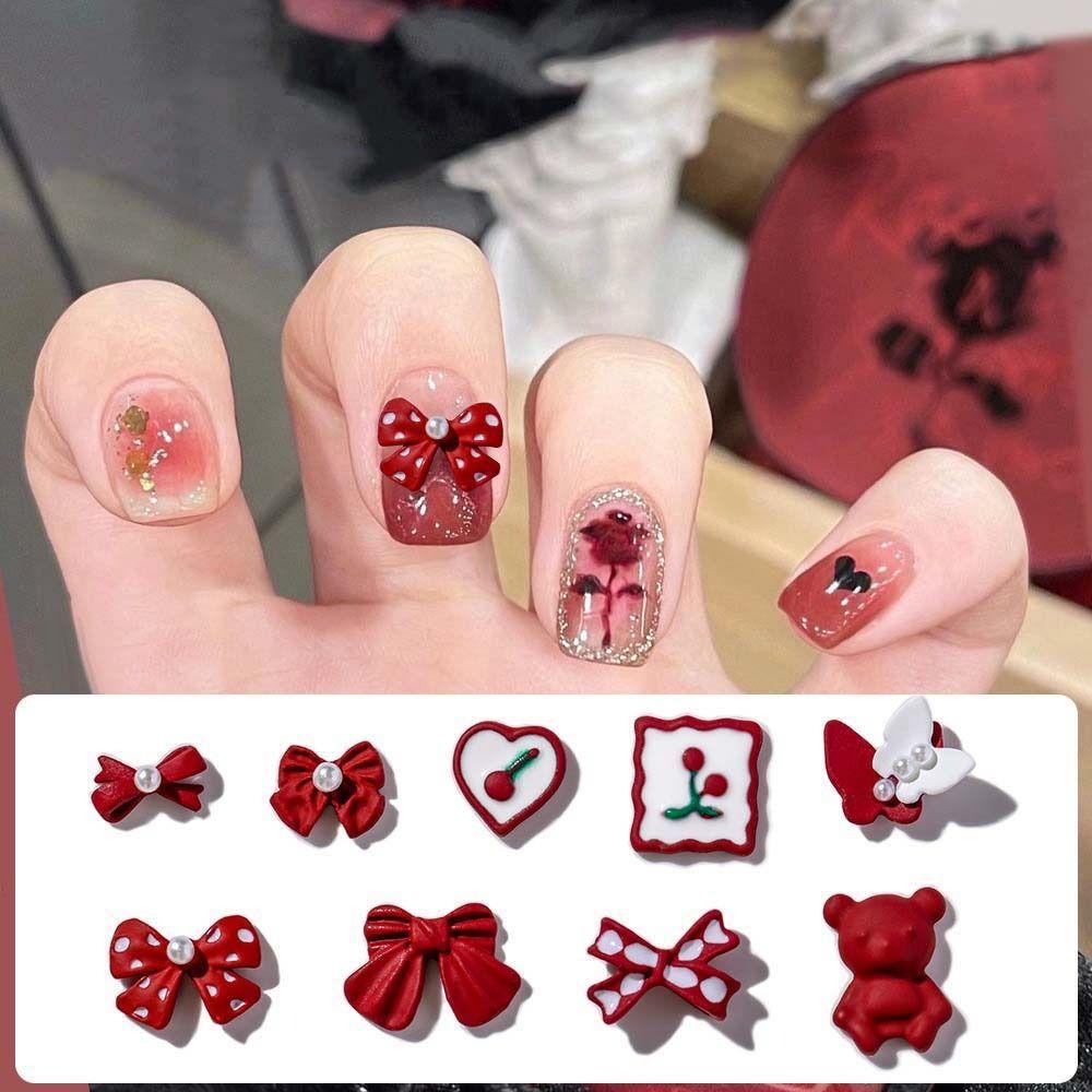 Bộ 5 Phụ Kiện Trang Trí Móng Tay Hình Nơ Màu Đỏ Đục Đính Đá Charm Năm Mới