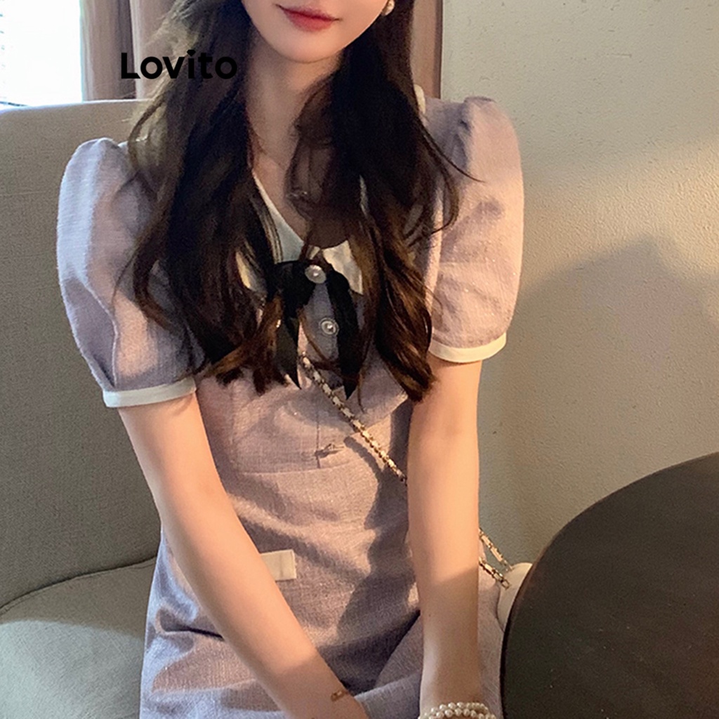 Đầm Lovito tay phồng cổ tương phản đính nơ phối túi giả màu trơn thường ngày cho nữ LNA17158