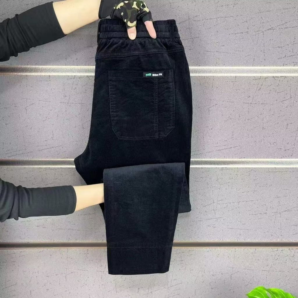 Quần Dài Dáng Ôm Vải Nhung Kẻ Sọc Phối Nhiều Túi Thời Trang Thu Đông Cho Nam