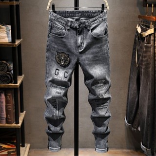 Quần Jean Dài Thêu Họa Tiết Bàn Chân Nhỏ Ôm Dáng Thời Trang Cho Nam