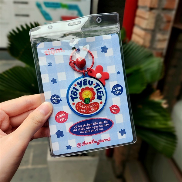 Móc khoá "Tôi yêu tiền"